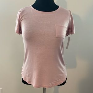 Super cute, open back blush colored blouse!